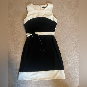 Black and white business dress with adjustable belt